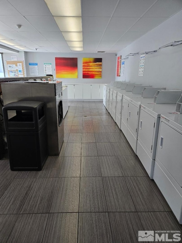community laundry room with independent washer and dryer