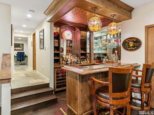 3750 Buckskin Rd, Carson City, NV 89703 - indoor wet bar featuring wine cooler, recessed lighting, pendant lighting, and baseboards
