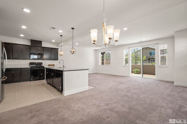 1987 Wind Ranch Rd Unit C, Reno, NV 89521 - kitchen featuring black appliances, a chandelier, light colored carpet, a sink, and recessed lighting
