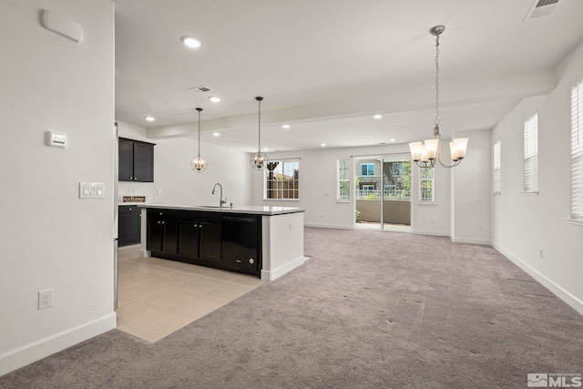 1987 Wind Ranch Rd Unit C, Reno, NV 89521 - kitchen featuring a chandelier, light colored carpet, recessed lighting, baseboards, and dark cabinets