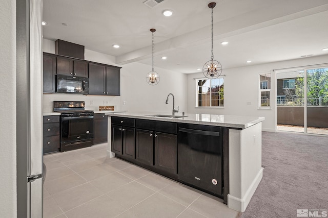 1987 Wind Ranch Rd Unit C, Reno, NV 89521 - kitchen with black appliances, a sink, light countertops, and recessed lighting