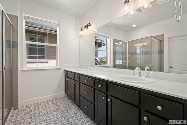 1987 Wind Ranch Rd Unit C, Reno, NV 89521 - full bathroom featuring a stall shower, double vanity, and baseboards