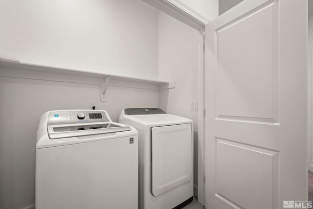 1987 Wind Ranch Rd Unit C, Reno, NV 89521 - washroom featuring washing machine and dryer