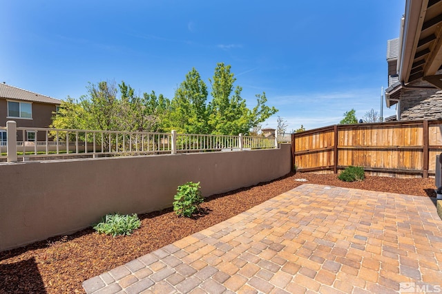 1987 Wind Ranch Rd Unit C, Reno, NV 89521 - view of patio / terrace featuring a fenced backyard