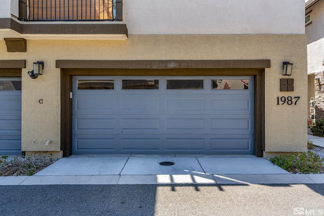 1987 Wind Ranch Rd Unit C, Reno, NV 89521 - garage with concrete driveway
