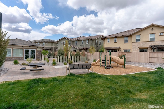 1987 Wind Ranch Rd Unit C, Reno, NV 89521 - view of play area featuring a residential view and a patio area