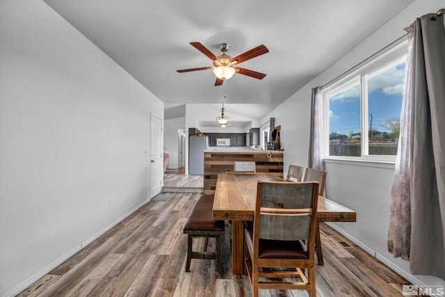 10205 Shenandoah Dr, Reno, NV 89508 - dining area with ceiling fan, baseboards, and wood finished floors