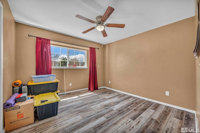 10205 Shenandoah Dr, Reno, NV 89508 - empty room with ceiling fan, wood finished floors, and baseboards