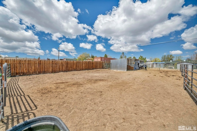 10205 Shenandoah Dr, Reno, NV 89508 - view of yard featuring an outbuilding and an exterior structure