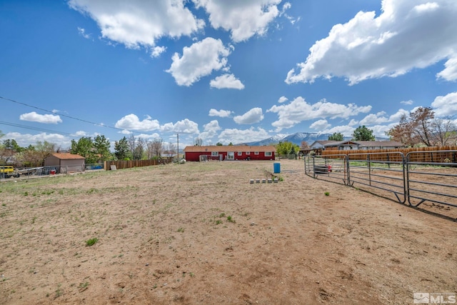 10205 Shenandoah Dr, Reno, NV 89508 - view of yard featuring a mountain view, a view of countryside, and fence