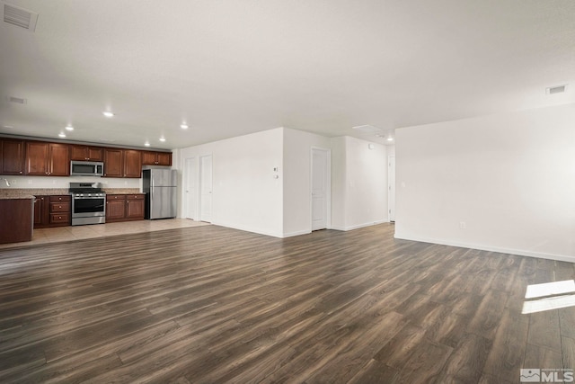8971 Sagemoor Dr, Reno, NV 89506 - unfurnished living room with recessed lighting, dark wood finished floors, and baseboards