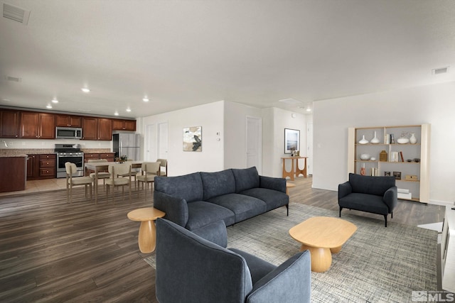 8971 Sagemoor Dr, Reno, NV 89506 - living area with wood finished floors and recessed lighting