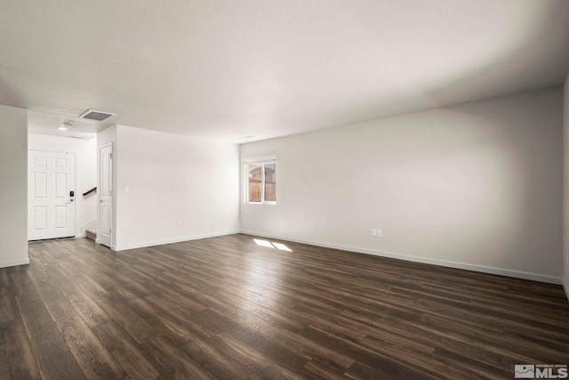 8971 Sagemoor Dr, Reno, NV 89506 - unfurnished living room featuring dark wood finished floors and baseboards