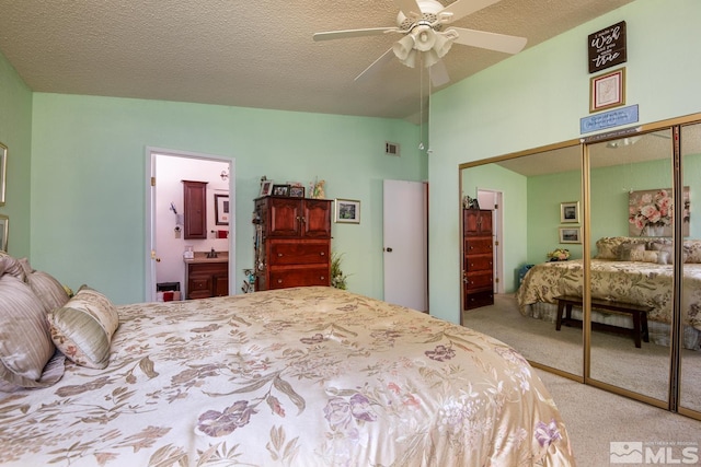 23 Upper Colony, Wellington, NV 89444 - carpeted bedroom with a closet, ensuite bathroom, ceiling fan, a textured ceiling, and a sink
