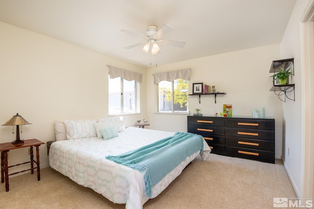 23 Upper Colony, Wellington, NV 89444 - bedroom with light colored carpet, ceiling fan, and baseboards