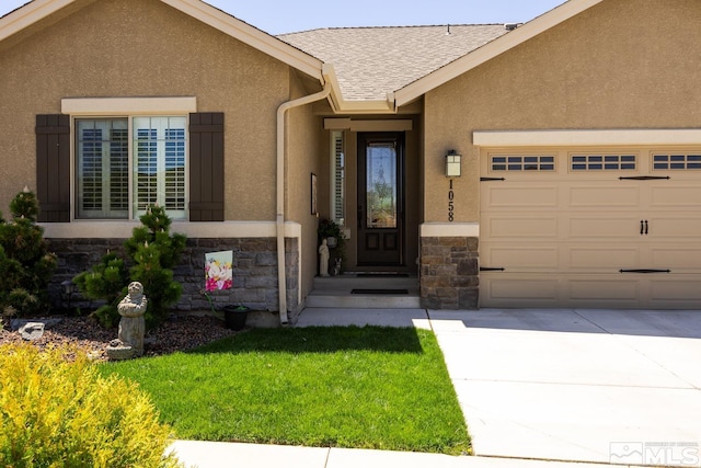 1058 Aspen Brook Ln, Gardnerville, NV 89460 - entrance to property featuring stone siding, an attached garage, concrete driveway, and stucco siding