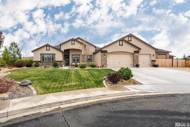 540 Clove Hitch Ct, Sparks, NV 89441 - view of front of home featuring stucco siding, stone siding, concrete driveway, and a garage