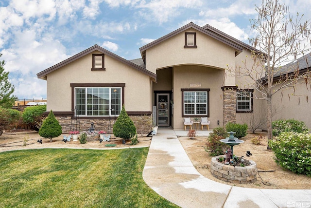 540 Clove Hitch Ct, Sparks, NV 89441 - view of front of property with stucco siding, a front lawn, and stone siding