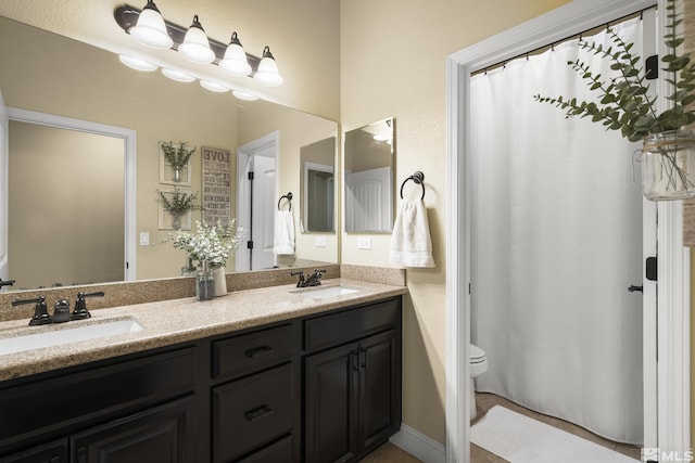 540 Clove Hitch Ct, Sparks, NV 89441 - bathroom featuring toilet and double vanity