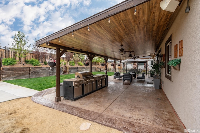540 Clove Hitch Ct, Sparks, NV 89441 - view of patio featuring ceiling fan, area for grilling, and an outdoor hangout area