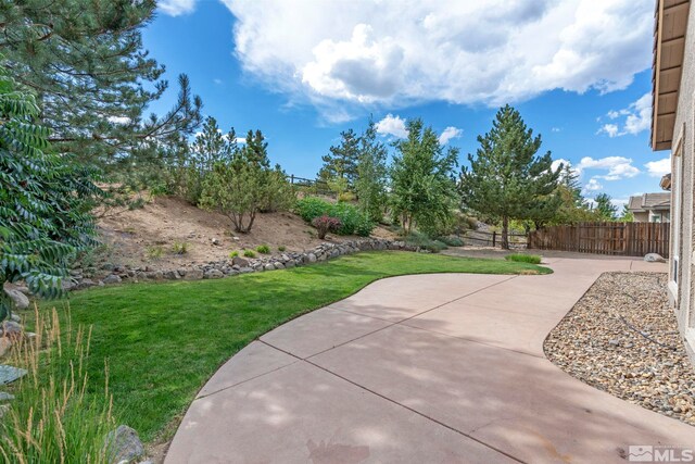 2705 Wind Feather Trl, Reno, NV 89511 - view of yard with a patio