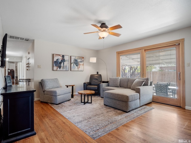 610 Akard Cir, Reno, NV 89503 - living room featuring ceiling fan, wood finished floors, and baseboards