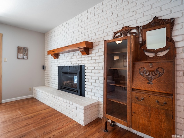 610 Akard Cir, Reno, NV 89503 - living area with wood finished floors, a fireplace, and baseboards