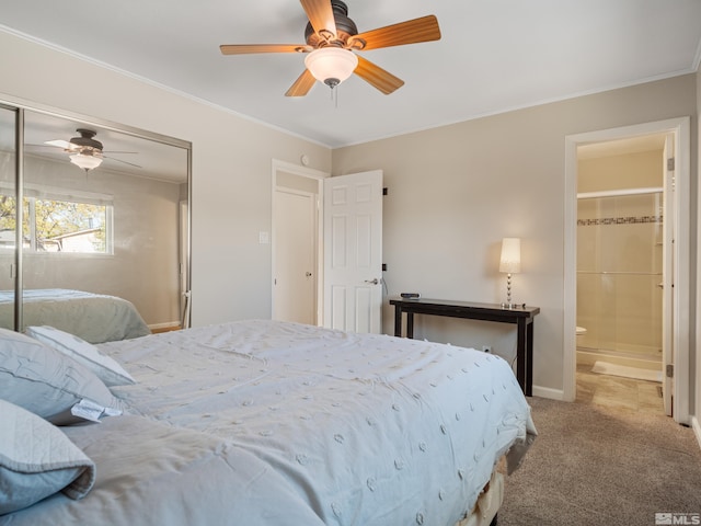 610 Akard Cir, Reno, NV 89503 - carpeted bedroom featuring a closet, ornamental molding, a ceiling fan, baseboards, and connected bathroom