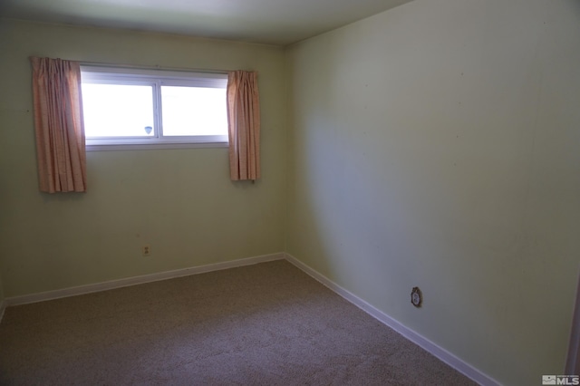 933 Cordone Ave, Reno, NV 89502 - unfurnished room with carpet floors and baseboards