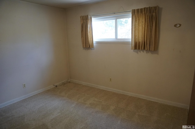 933 Cordone Ave, Reno, NV 89502 - empty room featuring light carpet and baseboards