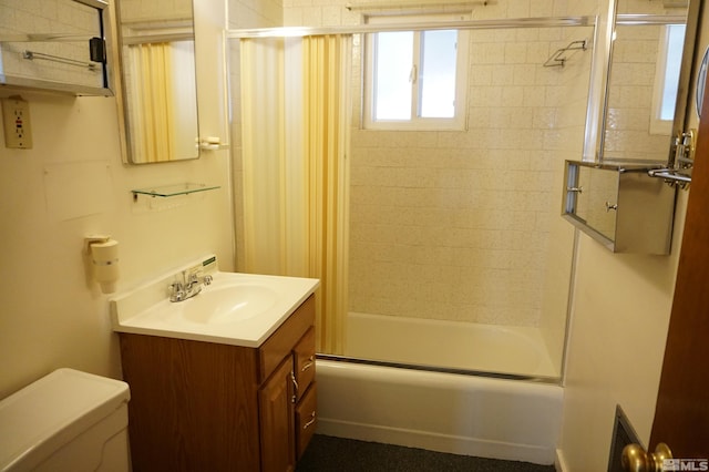 933 Cordone Ave, Reno, NV 89502 - bathroom featuring toilet, combined bath / shower with glass door, and vanity