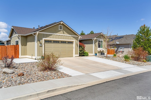 780 Ahwanee Dr, Sparks, NV 89436 - single story home with board and batten siding, fence, a garage, and driveway