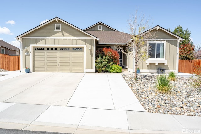 780 Ahwanee Dr, Sparks, NV 89436 - ranch-style home featuring board and batten siding, concrete driveway, a garage, and fence