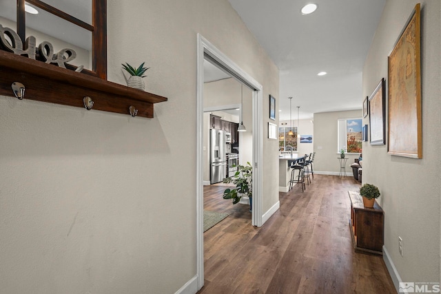 780 Ahwanee Dr, Sparks, NV 89436 - hallway with dark wood-style floors, recessed lighting, and baseboards
