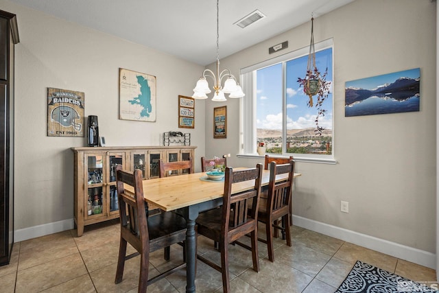 780 Ahwanee Dr, Sparks, NV 89436 - dining space with a chandelier, baseboards, and light tile patterned floors