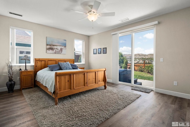 780 Ahwanee Dr, Sparks, NV 89436 - bedroom featuring access to outside, light wood-style flooring, multiple windows, and baseboards