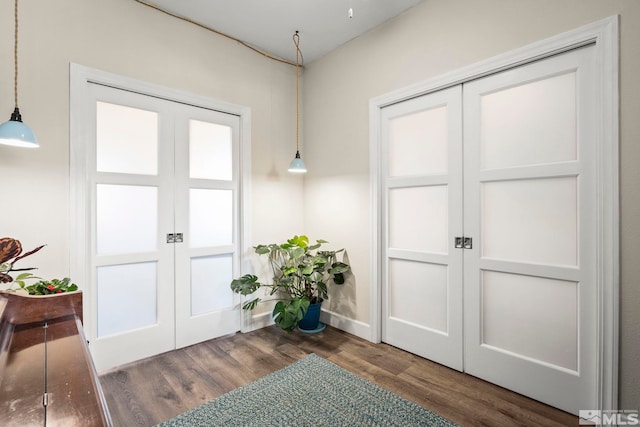 780 Ahwanee Dr, Sparks, NV 89436 - doorway with french doors, wood finished floors, and baseboards