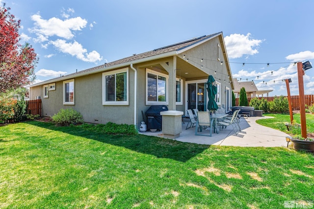 780 Ahwanee Dr, Sparks, NV 89436 - back of property with a patio, stucco siding, and crawl space