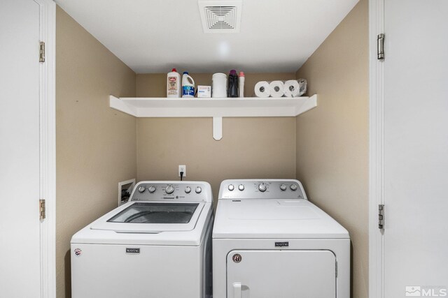 8127 Anchor Point Dr, Reno, NV 89506 - laundry area with washer and dryer
