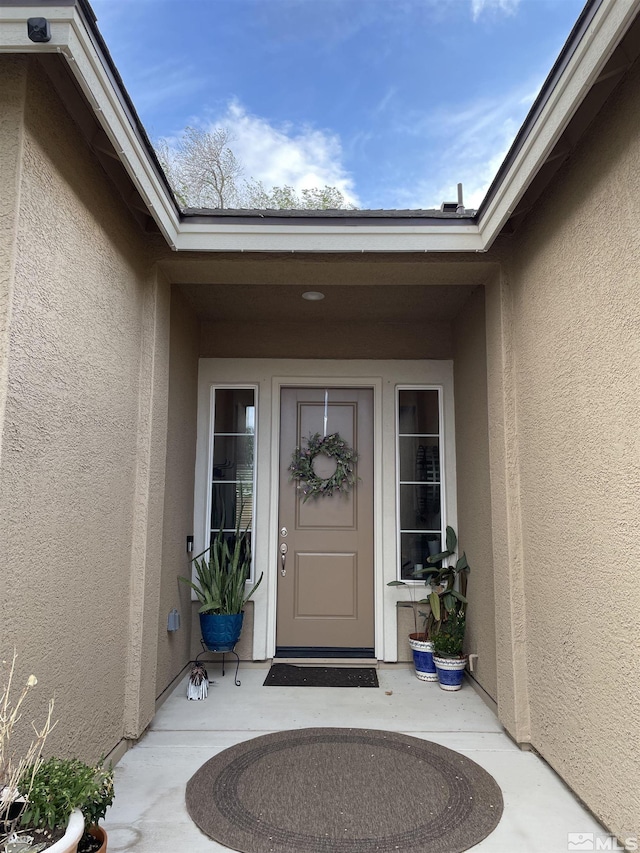 684 Rose Ln, Fernley, NV 89408 - view of exterior entry featuring stucco siding