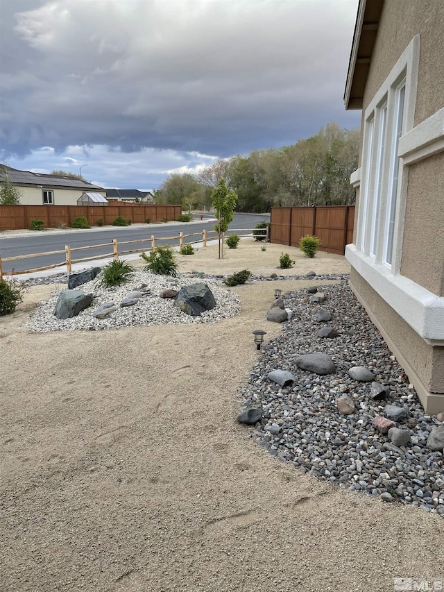 684 Rose Ln, Fernley, NV 89408 - view of yard featuring fence