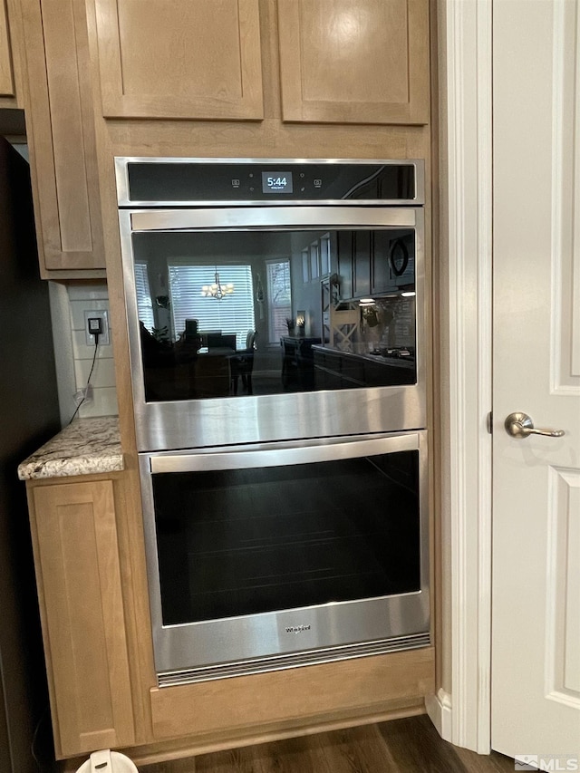 684 Rose Ln, Fernley, NV 89408 - kitchen view of double oven and light stone countertops