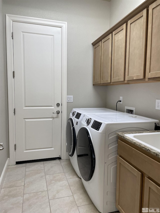 684 Rose Ln, Fernley, NV 89408 - clothes washing area with cabinet space, independent washer and dryer, and light tile patterned floors
