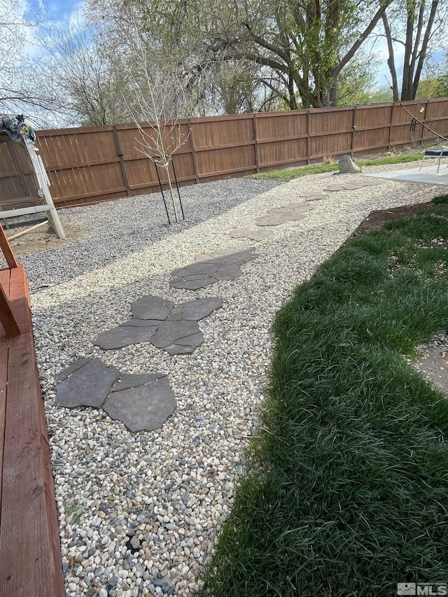 684 Rose Ln, Fernley, NV 89408 - view of yard featuring fence