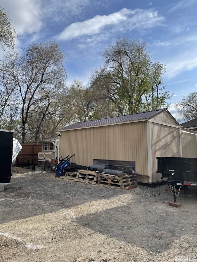 684 Rose Ln, Fernley, NV 89408 - view of outdoor structure featuring fence