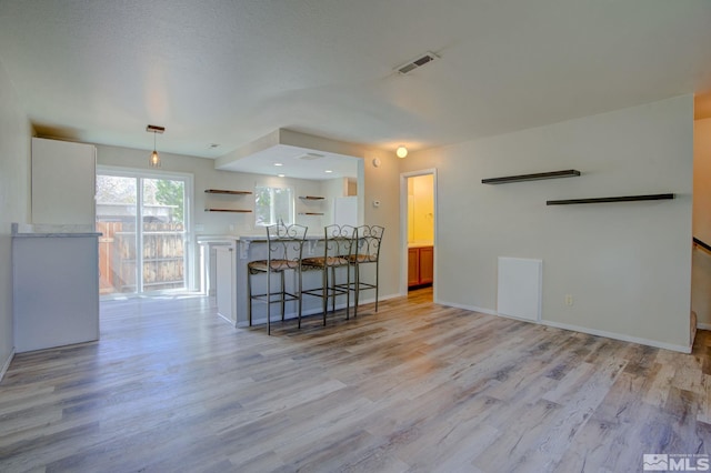 1488 Douglas Ave, Gardnerville, NV 89410 - living area with light wood-style flooring and baseboards