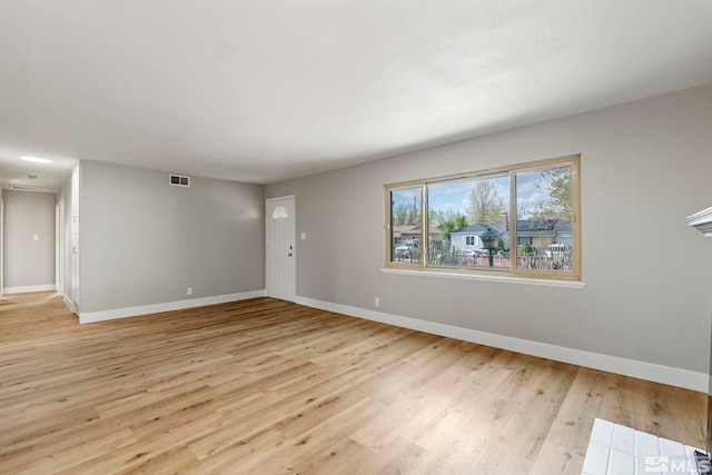 1365 Prospect Ave, Sparks, NV 89431 - unfurnished living room with baseboards and light wood finished floors