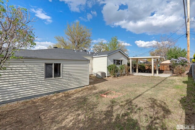 1365 Prospect Ave, Sparks, NV 89431 - view of yard featuring central AC and a patio area