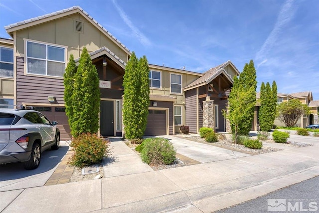 4889 Bougainvillea Cir, Sparks, NV 89436 - view of front of home with concrete driveway and a garage