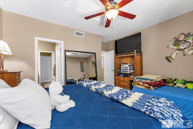 4889 Bougainvillea Cir, Sparks, NV 89436 - bedroom with ceiling fan and tile patterned floors